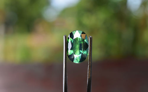 Close-up of metal pole against blurred background