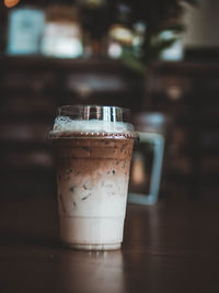 Close-up of coffee cup on table