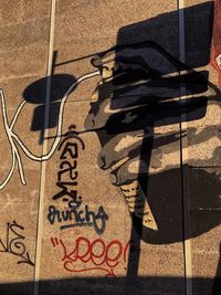 High angle view of shadow on floor