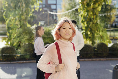 Smiling woman looking at camera