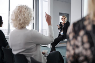 Woman having a presentation during meeting