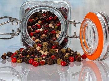 High angle view of strawberries in jar on table