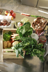 Fresh orgnaic vegetables and fruits in a kitchen