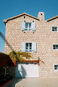 Low angle view of building against clear sky