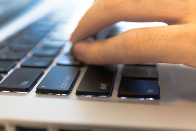 Close-up of person using mobile phone