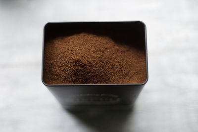 High angle view of coffee cup on table