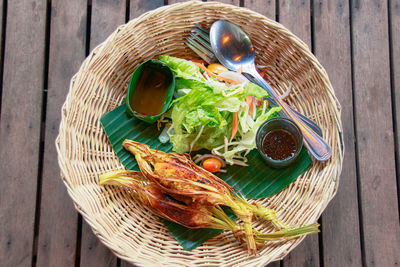 High angle view of food in basket on table