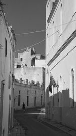 Buildings in city against sky