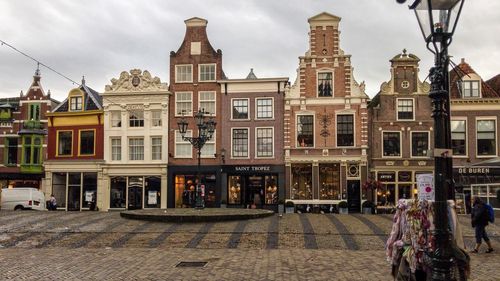 Buildings in city against sky