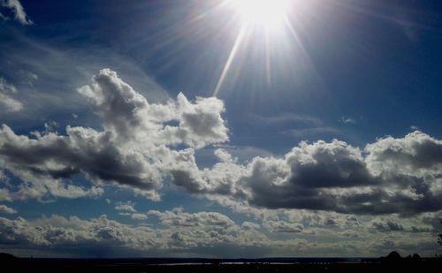 Sun shining through clouds