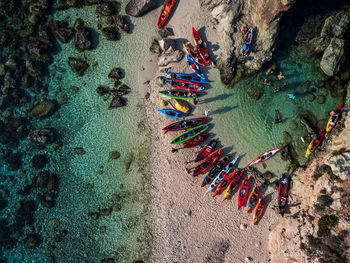 Hdr topdown drone shot of our kayak team over the island of kemmunett, malta, summer 2021. 