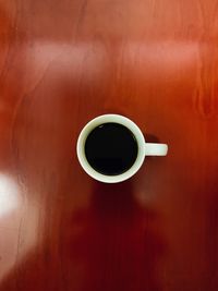 Directly above shot of coffee cup on table