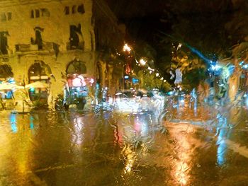 Close-up of wet car window during rainy season