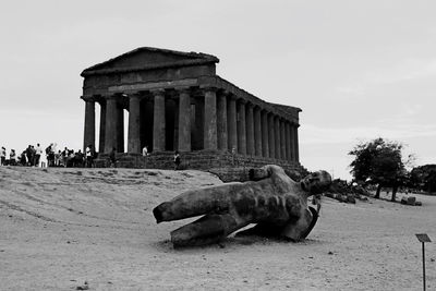 Statue of historic building against sky