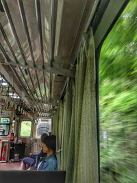 View of woman in train