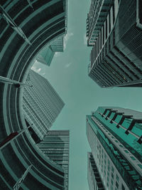 Low angle view of buildings against sky in city