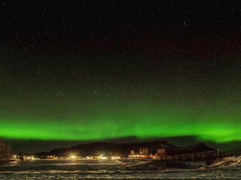 Scenic view of illuminated northern lights 