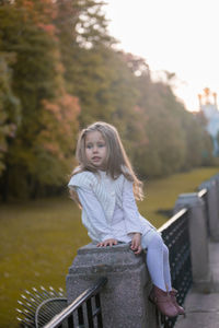 Beautiful little child girl walking in a park