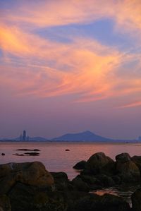 Scenic view of sea against sky during sunset