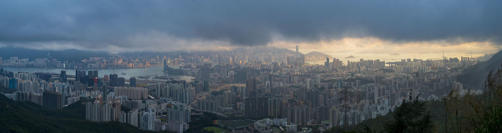 Hong kong cityscape viewed from kowloon peak at sunset