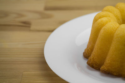 Close-up of bundt lemon cake in plate