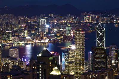 Illuminated cityscape at night