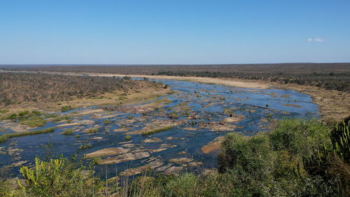 Scenic view of landscape against clear sky