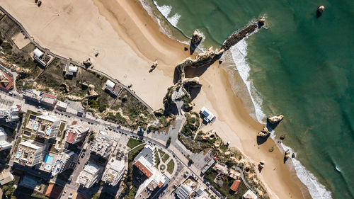 Aerial view of city by beach