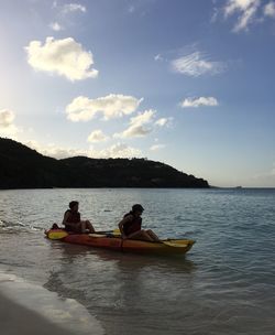 Boat in lake against sky