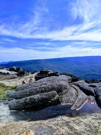 Scenic view of rock formation against sky