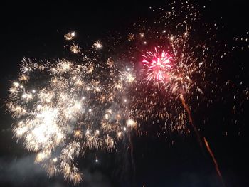 Low angle view of firework display