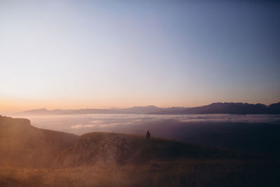 Scenic view of landscape against sky during sunset