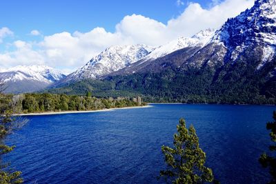 Scenic view of lake with mountains in background