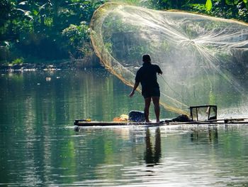 Reflection of woman in water