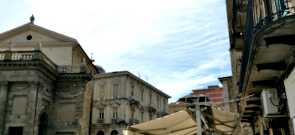 Low angle view of buildings against sky