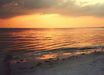 Scenic view of sea at sunset