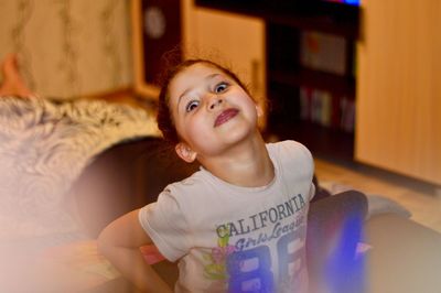 Portrait of smiling girl at home