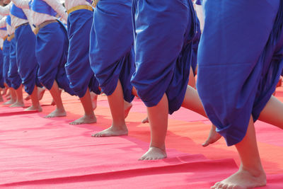 Low section of dancers performing during traditional festival