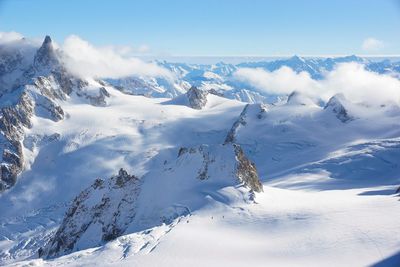 Scenic view of snowcapped mountains during winter