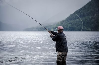 Man fishing in sea