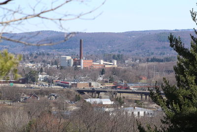 Cityscape with mountain range in background