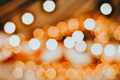 Defocused image of illuminated lights at night