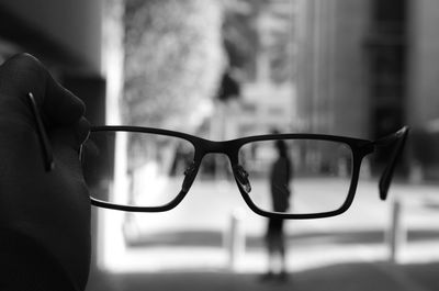 Close-up of man wearing eyeglasses