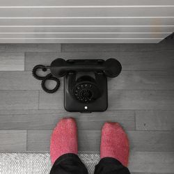 Low section of man standing on floor