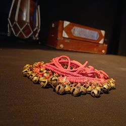 Foot ornaments, harmonium, tabla