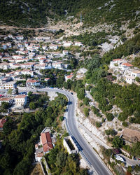 High angle view of road amidst buildings in city