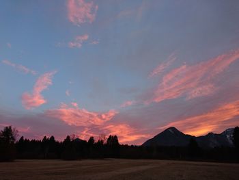 Scenic view of landscape at sunset