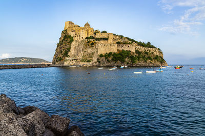 View of aragonese castle or castello aragonese in ischia, italy