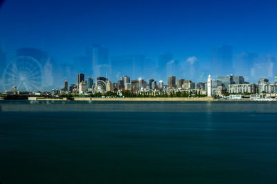 Buildings in city at waterfront