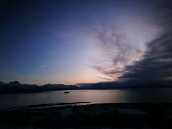 Scenic view of sea against sky at sunset